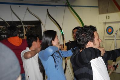 Four archers recurve archery lesson